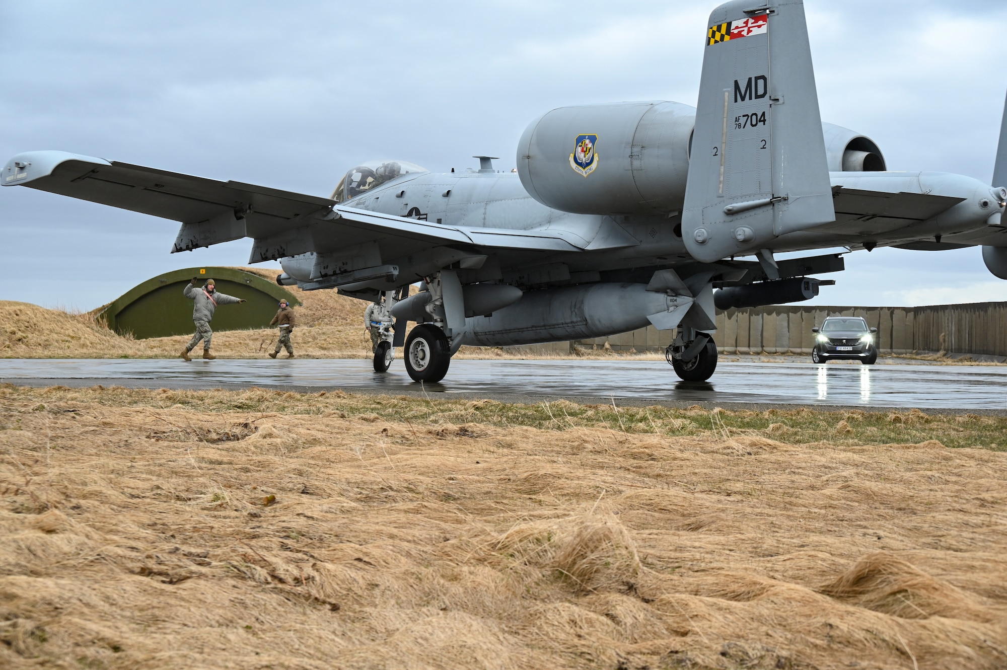 An A-10C Thunderbolt II aircraft assigned to the 104th Fighter Squadron, Maryland Air National Guard, taxis at Andoya Air Base in Andenes, Norway, ready to conduct Agile Combat Employment training in support of the Swift Response exercise, May 6, 2022. Swift Response is an annual USAREUR-AF led multinational training exercise designed to enhance readiness and airborne interoperability with allies and partners. (U.S. Air National Guard photo by Tech. Sgt. Enjoli Saunders)
