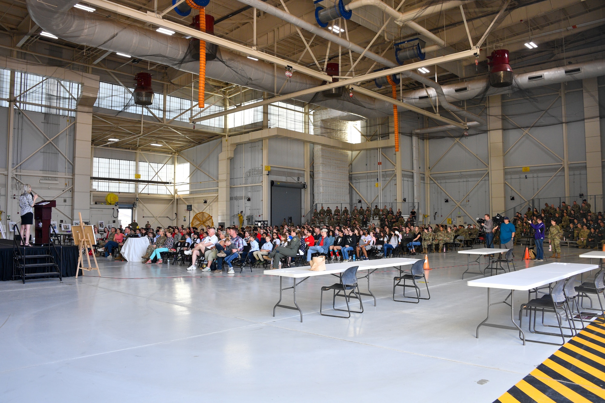 Erin Miller speaks to an audience at Dyess Air Force Base, Texas, on April 29, 2022. The Women’s Summit celebrated the 80th anniversaries of the Women Airforce Service Pilots program or WASPs, 8th Air Force, and the 317th Airlift Wing.(U.S. Air Force photo by Staff Sgt. Nije Hightower)