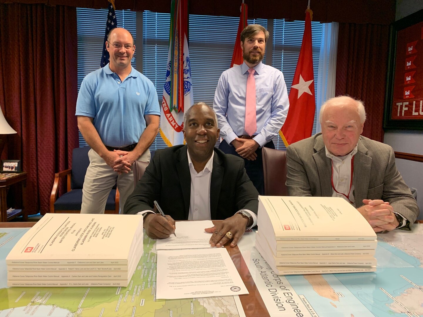 Brig. Gen. Jason Kelly, commanding general, South Atlantic Division, signing the Updated Water Control Manuals for the Alabama-Coosa-Tallapoosa River Basin.