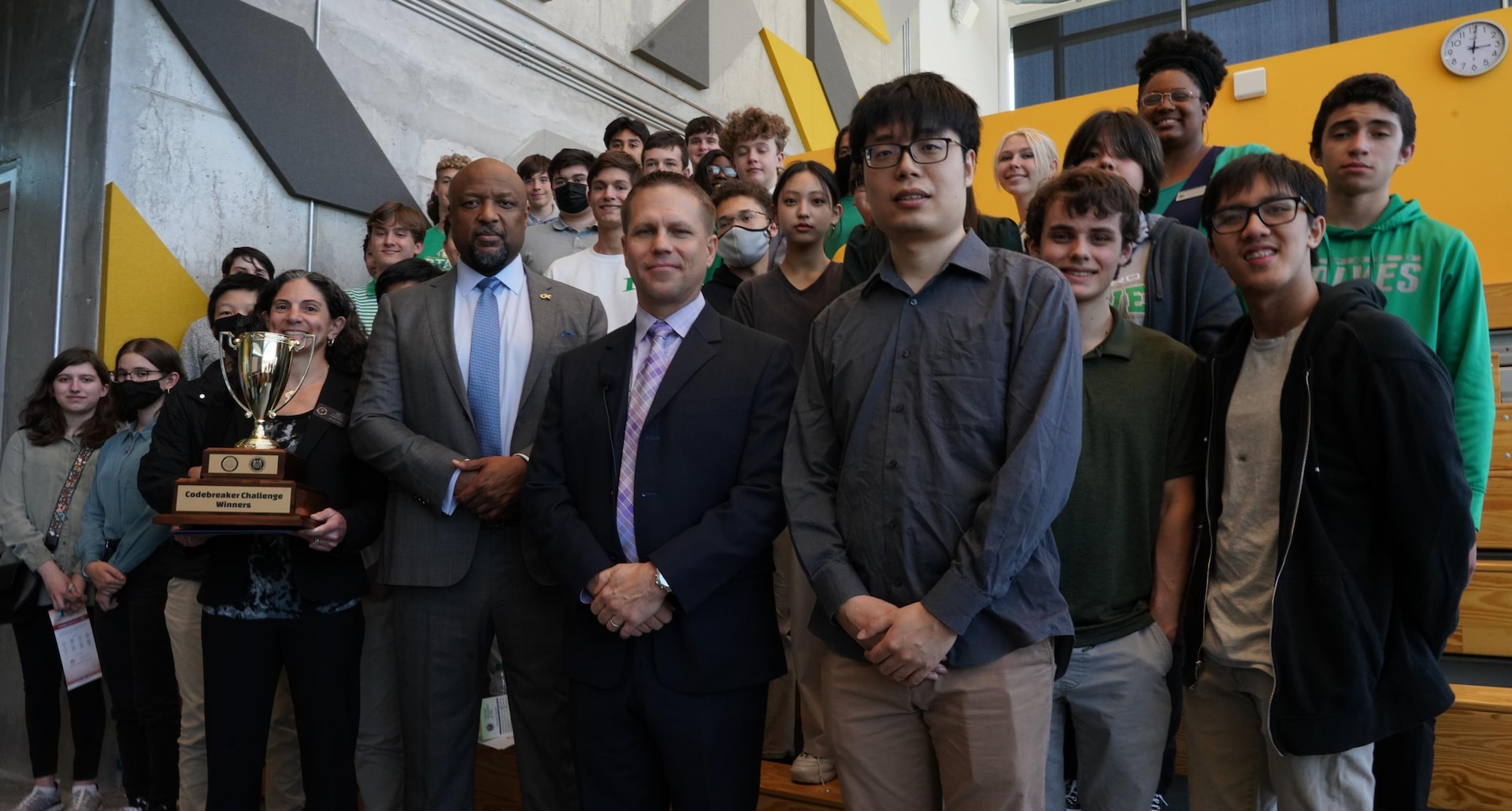 NSA and Georgia Tech leadership pose with victorious members of last year's Codebreaker Challenge.