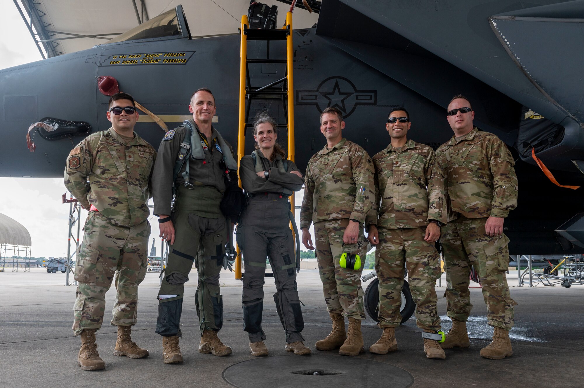 Col. Leah Fry, 4th Maintenance Group commander, and 4th Fighter Wing and leadership pose for a photo after Fry’s fini flight at Seymour Johnson Air Force Base, North Carolina, May 4, 2022. Fry commanded the maintenance group which provides maintenance to the largest F-15E Strike Eagle fleet in Air Combat Command. (U.S. Air Force photo by Senior Airman Kevin Holloway)