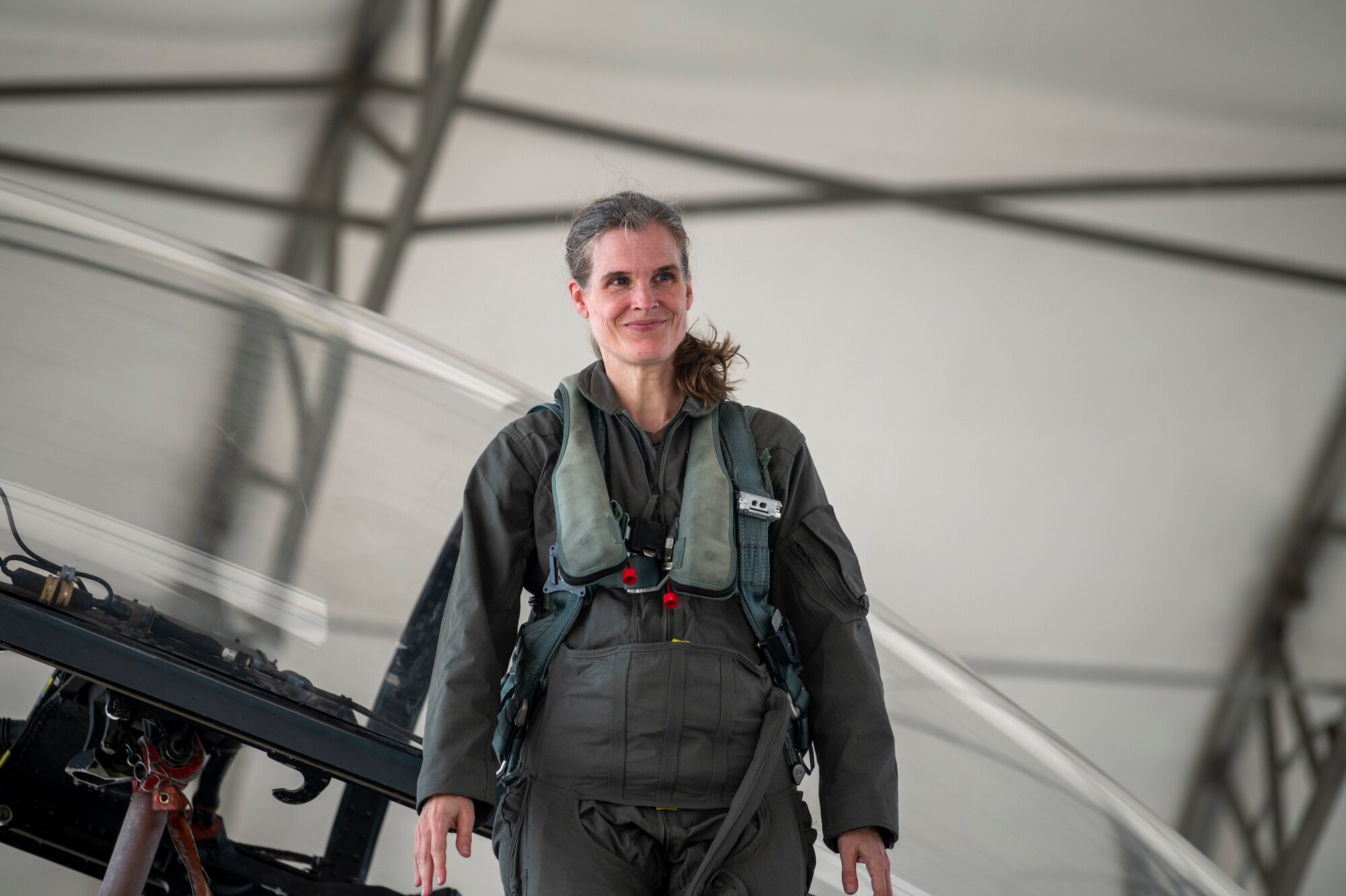 Col. Leah Fry, 4th Maintenance Group commander, steps out of an F-15E Strike Eagle at Seymour Johnson Air Force Base, North Carolina, on May 4, 2022. Fry is retiring from the U.S. Air Force after 26 years of service. (U.S. Air Force photo by Senior Airman Kevin Holloway)