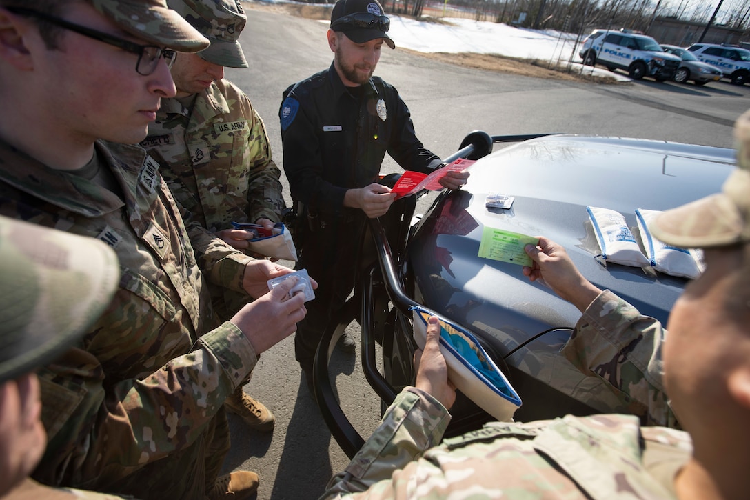 Alaska National Guardsmen Sgt. 1st Class Oliver Meza, noncommissioned officer in charge of Drug Demand Reduction, trains guardsmen and police officers in the use of naloxone kits provided through Project HOPE in Wasilla, Alaska, April 13, 2022. The Alaska National Guard collaborates with the Office of Substance Misuse and Addiction Prevention in Project HOPE, a state-run initiative aimed at providing opioid overdose rescue kits and training mission partners and law enforcement agencies. (Alaska National Guard photo by Victoria Granado)