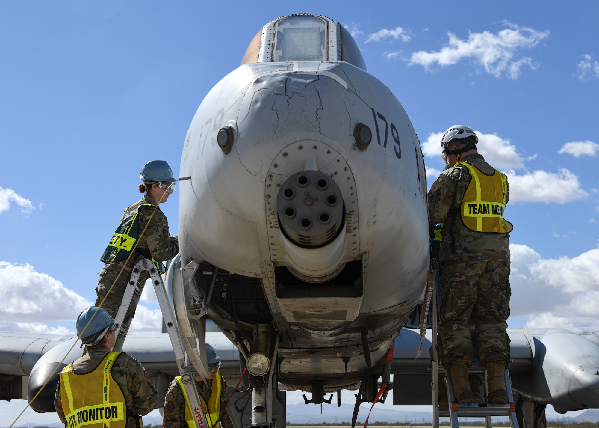 A photo of Airmen preparing an aircraft.