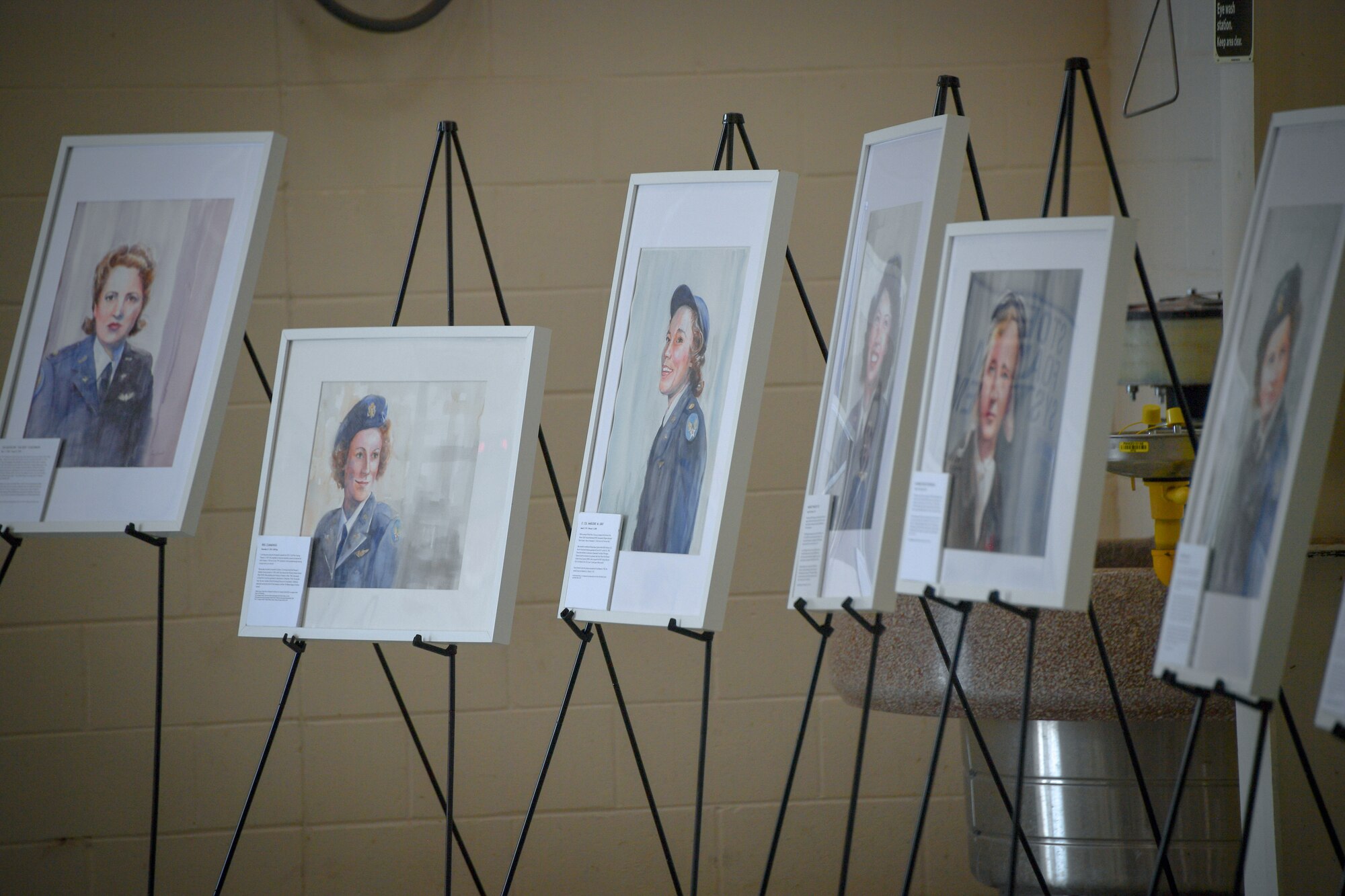 Painted portraits of past Women Airforce Service Pilots are displayed in the hangar at Dyess Air Force Base, Texas, April 29, 2022. The Women’s Summit celebrated the 80th anniversaries of the Women Airforce Service Pilots program or WASPs, 8th Air Force, and the 317th Airlift Wing.(U.S. Air Force Photos by Staff Sgt. Nije Hightower)