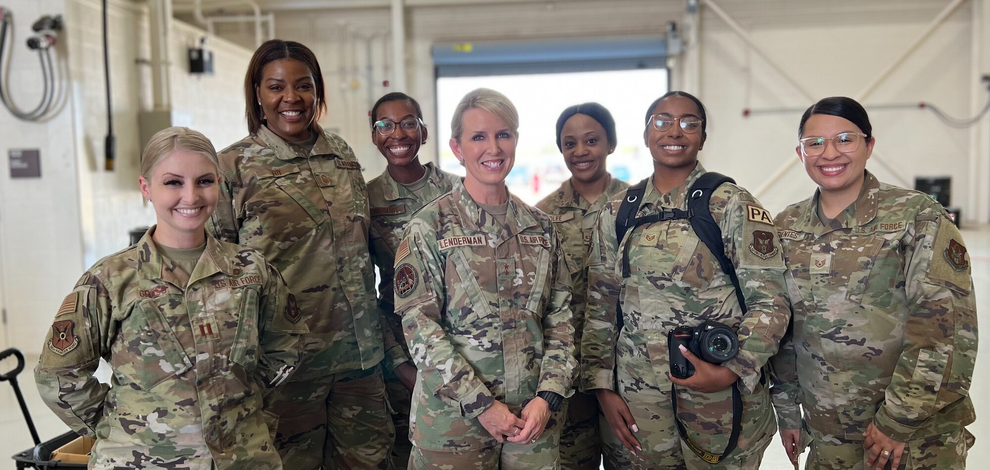 Members from the 301st Fighter Wing and Major General Laura L. Lenderman (center) pose for a photo at Dyess Air Force Base, Texas, on April 29, 2022. The Women’s Summit celebrated the 80th anniversaries of the Women Airforce Service Pilots program or WASPs, 8th Air Force, and the 317th Airlift Wing. (U.S. Air Force photo by Staff Sgt. Nije Hightower)