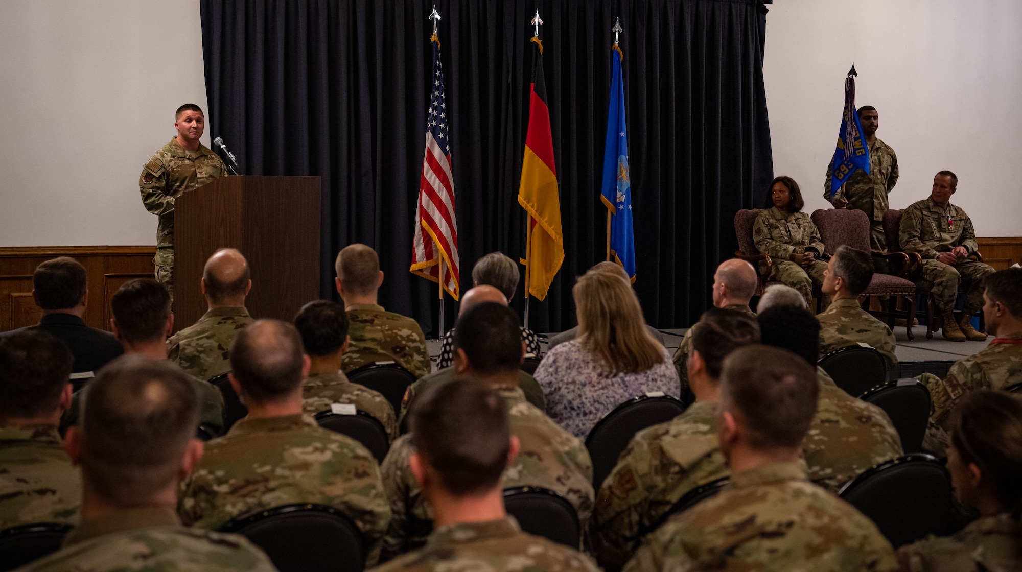 US Air Force Col Creighton Mullins, 693rd Intelligence, Surveillance and Reconnaissance Group commander, addresses Airmen just after assuming command of the group at Ramstein Air Base, Germany, May 6, 2022. The 693rd ISRG and its 3 subordinate squadrons conduct a variety of multi-intelligence operations, providing information to three combatant commands, combat forces and national leadership.