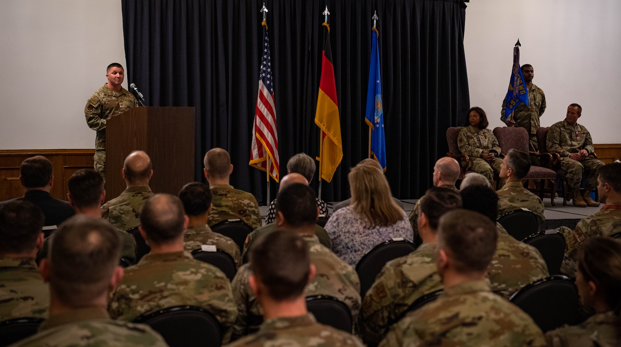 US Air Force Col Creighton Mullins, 693rd Intelligence, Surveillance and Reconnaissance Group commander, addresses Airmen just after assuming command of the group at Ramstein Air Base, Germany, May 6, 2022. The 693rd ISRG and its 3 subordinate squadrons conduct a variety of multi-intelligence operations, providing information to three combatant commands, combat forces and national leadership.