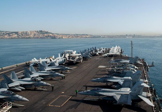 220510-N-ZE328-1004 NAPLES, Italy (May 10, 2022) The Nimitz-class aircraft carrier USS Harry S. Truman (CVN 75) pulls into Naples, Italy for a scheduled port visit, May 10, 2022. The Harry S. Truman Carrier Strike Group is on a scheduled deployment in the U.S. Sixth Fleet area of operations in support of U.S., Allied and partner interests in Europe and Africa. (U.S. Navy photo by Mass Communication Specialist 2nd Kelsey Trinh)