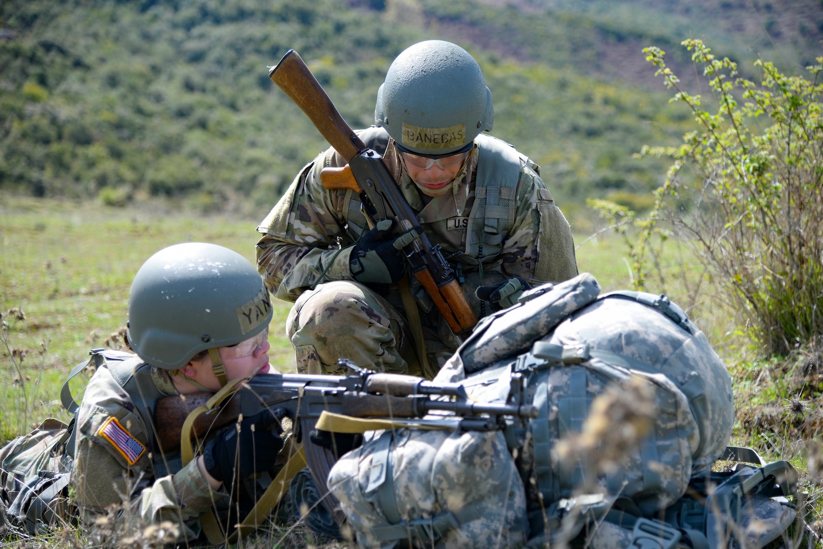 U.S. Army Officer Candidate School cadets Julia Yang and Helder Banegas, with the New Jersey Army National Guard, participate in combined leadership and hilltop tactics familiarization at the Bunavi Individual Training Center, April 6, 2022, in Vlorë, Albania. New Jersey Army National Guard soldiers selected to Officer Candidate School, along with their leadership cadre, traveled to Albania to participate with Albanian Armed Forces OCS cadets, strengthening the 20 year New Jersey–Albania Partnership, which is one of 22 European partnerships that make up the U.S. European Command State Partnership Program and one of 65 worldwide partnerships that make up the National Guard State Partnership Program.