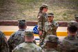 U.S. Army Staff Sgt. Zoe Marie Kimbell Tompkins addresses Soldiers during a change of responsibility rehearsal on JBSA Lackland Air Force Base, March 17, 2022.
