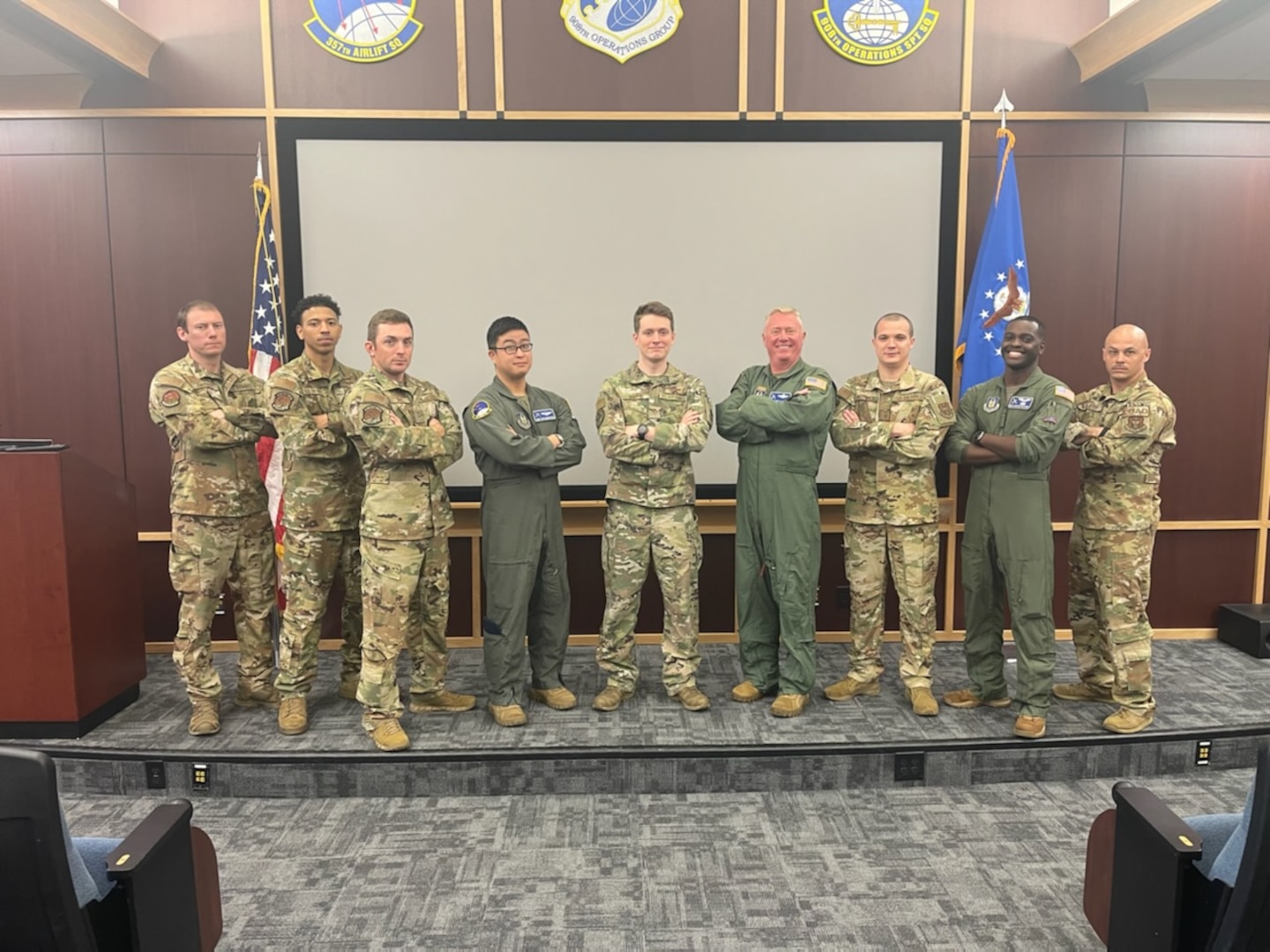 Members pose for a photo after graduating a class.