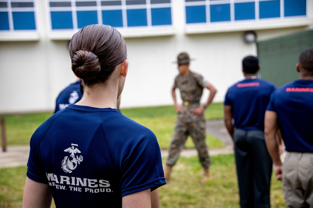 An officer candidate with Recruiting Station Sacramento participates in a monthly pool function in South Sacramento, California on March 19, 2022. Pool functions are designed for future Marines to build camaraderie, improve fitness and learn leadership skills in preparation for Officer Candidates School. (U.S. Marine Corps photo by Cpl. Seaira Moore)