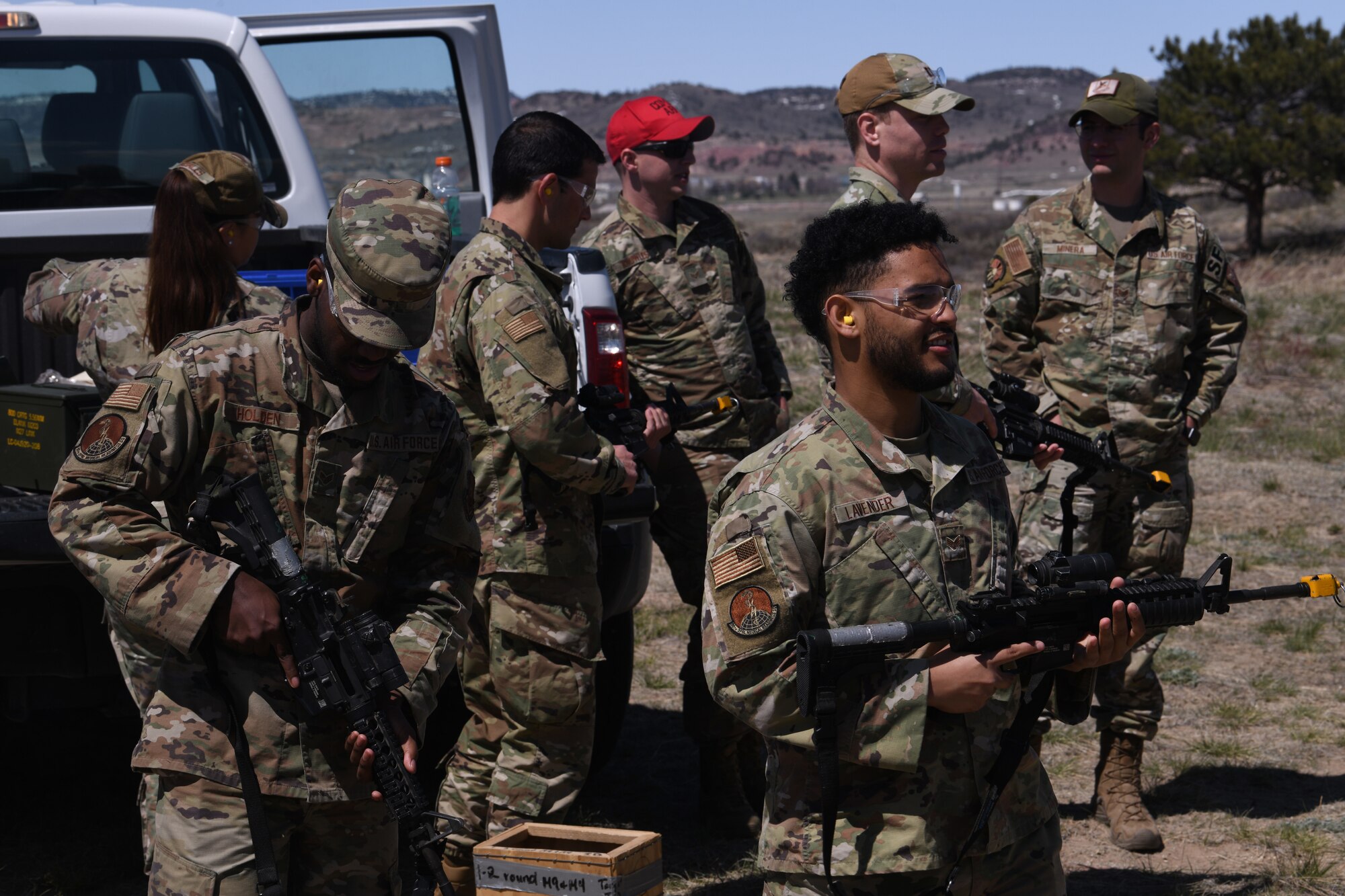 Members of the 90th Medical Group from F.E. Warren Air Force Base, Wyoming, prepare to participate in combat exercises at Camp Guernsey, Wyoming April 25, 2022. The 90 MDG visit gave both units an opportunity to improve readiness. The 90 GCTS integrated certain medical practices in their everyday operations while the 90 MDG was able to practice certain combat tactics taught by the 90 GCTS. (U.S. Air Force photo by Airman 1st Class Darius Frazier.)