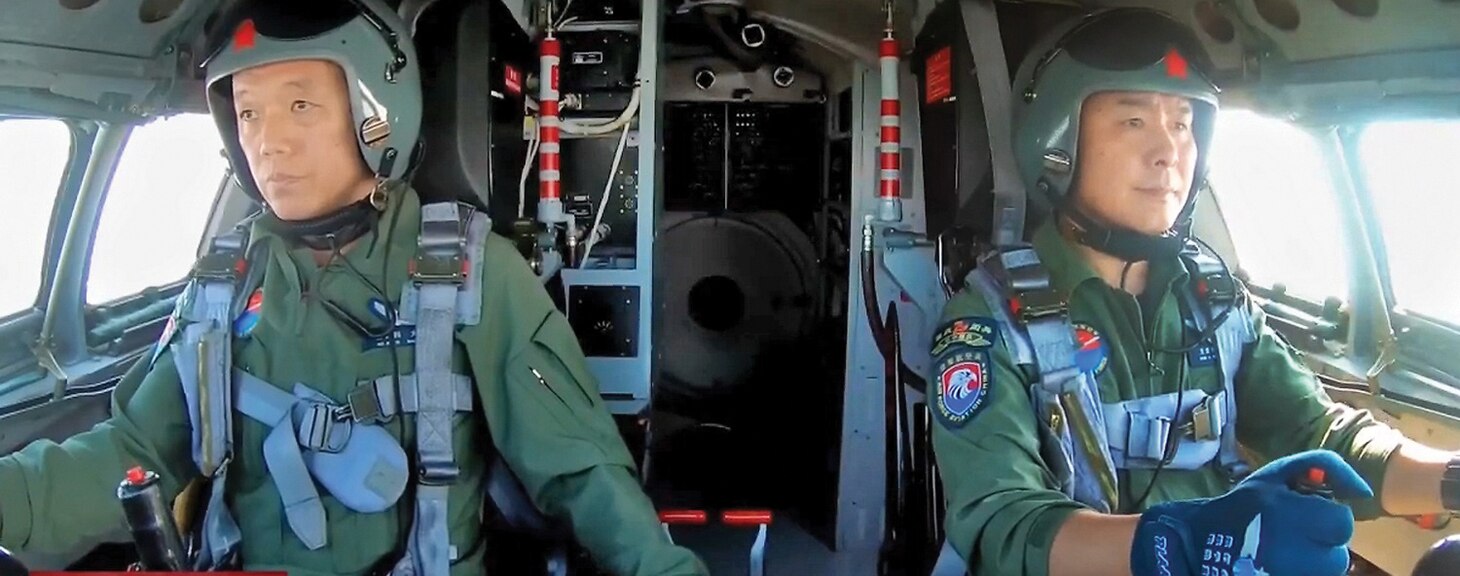 The pilot and copilot of an H-6K Badger bomber of the 29th Air Regiment about to touch down. The captain is in the left seat and is in command as well as in control. (Photo courtesy of Yefim Gordon, Dmitriy Komissarov, and Crécy Publications.)