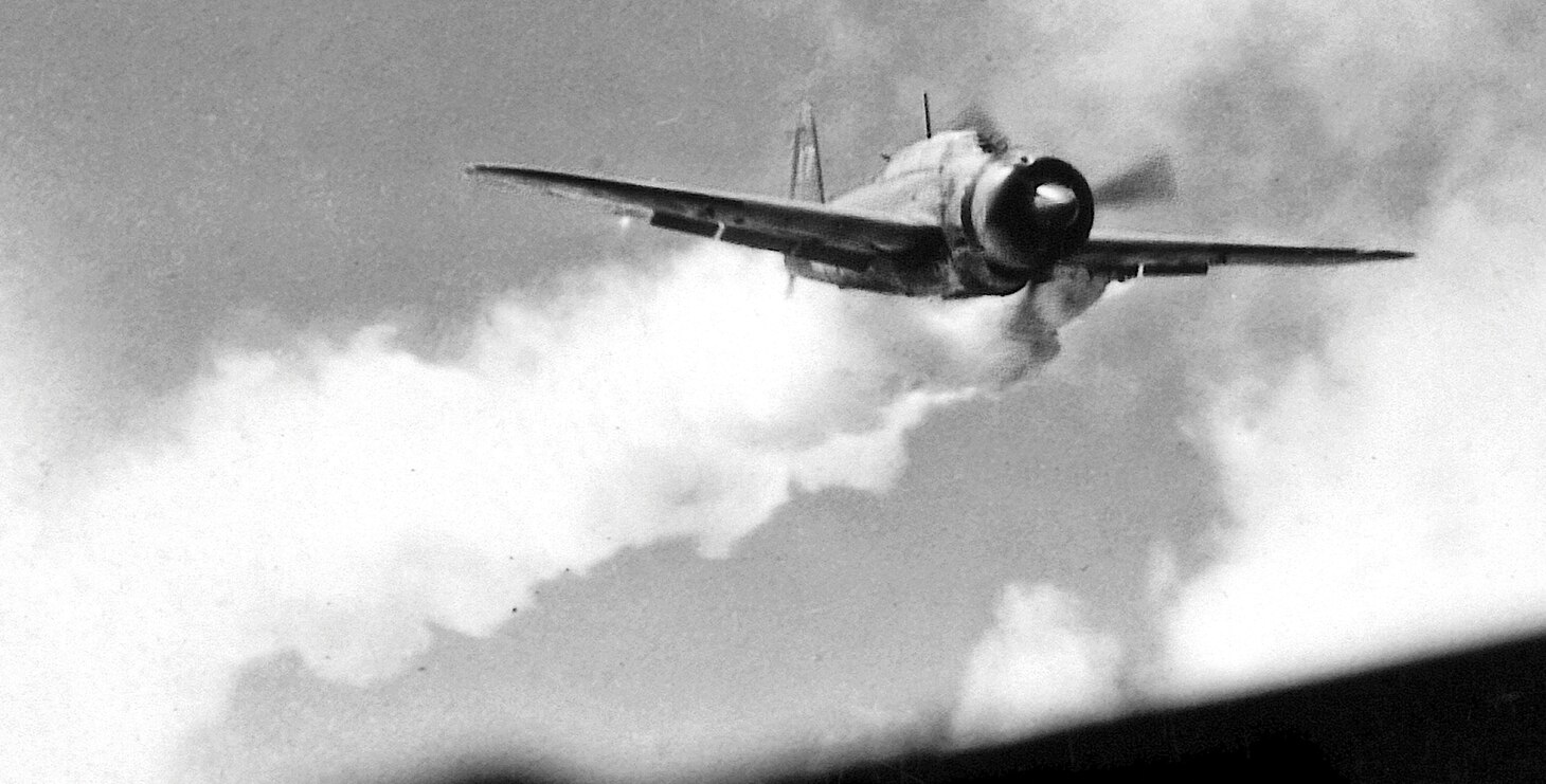 This familiar photo shows a D4Y3 on its suicide run against the carrier USS Essex (CV 9) on Nov.  25, 1944. The Judy and its two-man crew struck the carrier’s flight deck causing an explosion and fire that killed 15 and wounded 44. Note the aircraft’s round, open nose indicating it used a radial engine. (National Archives and Records Administration)