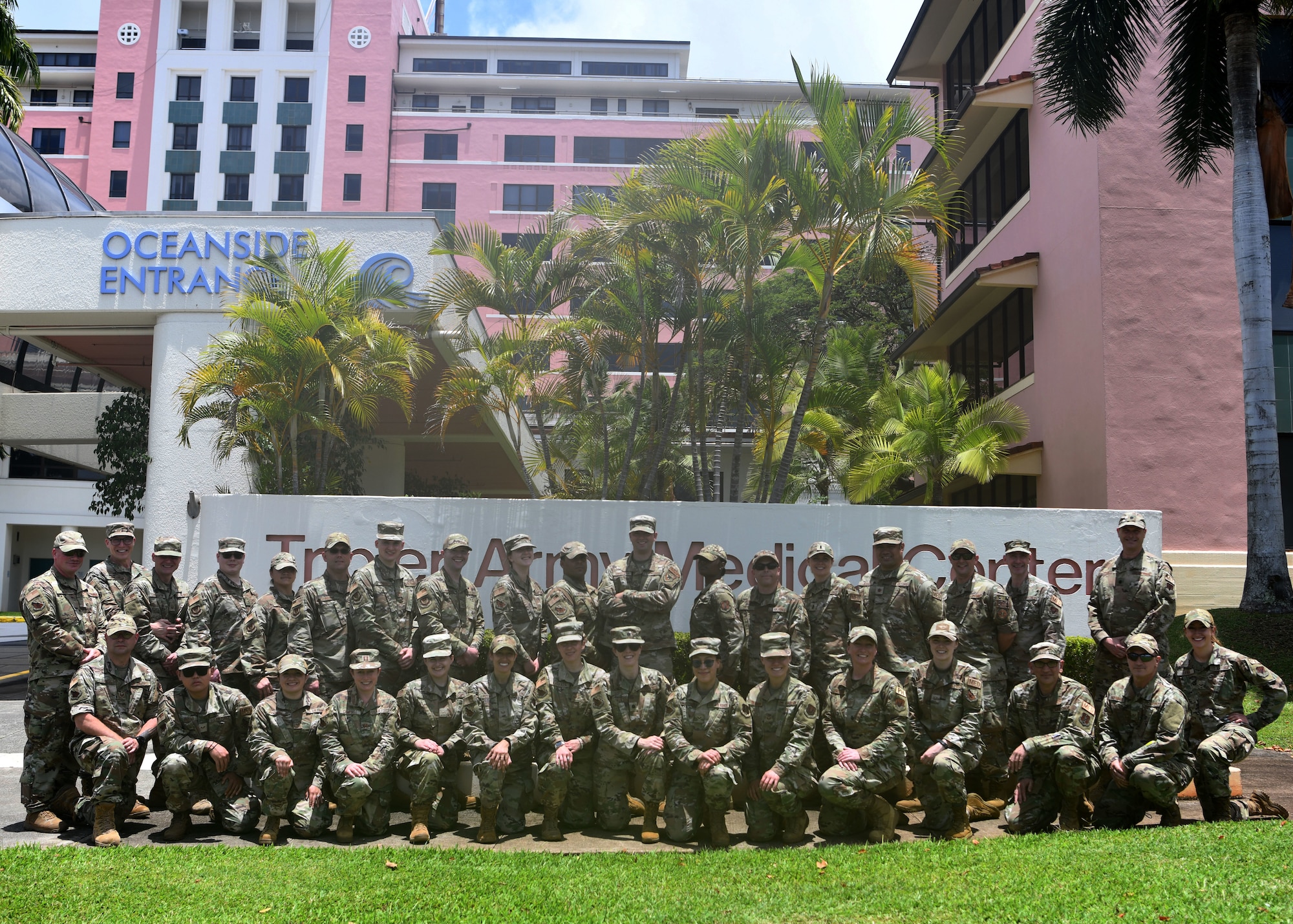 Members from the 104th Fighter Wing Medical Group pose for a group photo during their Medical Field Annual Training at Tripler Army Medical Center, Honolulu, Hawaii, May 3, 2022. This training allowed 104MDG members the opportunity to train in and provide support to an active-duty military hospital. (U.S. Air National Guard Photo by Senior Airman Camille Lienau)
