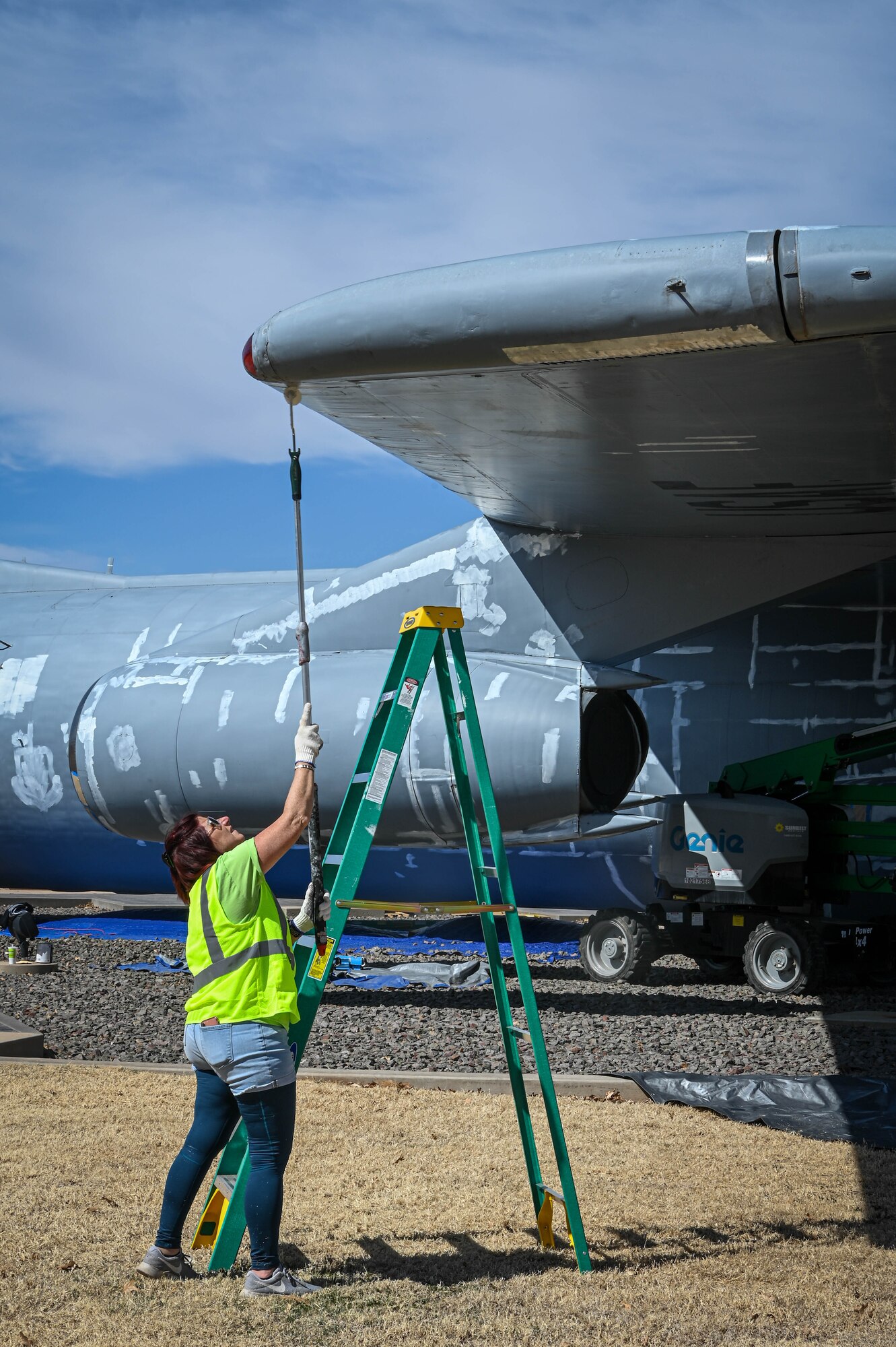Linda Orefice, a technician, paints a static C-141 Starlifter at Altus Air Force Base, Oklahoma, March 2, 2022. Cleaning the aircraft prevents corrosion, mechanical stress, dust, pollution, excessive heat and humidity, and damage to the aircraft from prolonged exposure to ultraviolet and infrared light. (U.S. Air Force photo by Senior Airman Kayla Christenson)