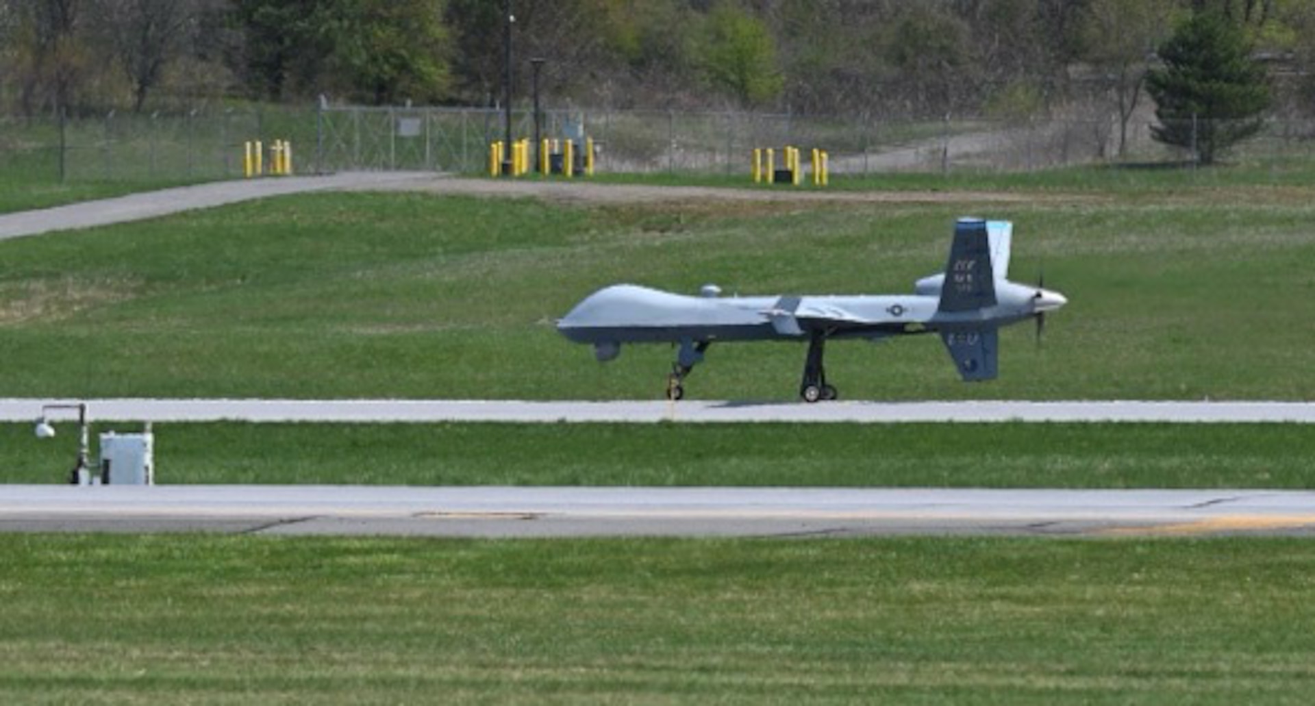An MQ-9 Reaper remotely piloted aircraft lands at Griffiss International Airport in Rome, New York on May 5, 2022 as the 174th Attack Wing of the New York Air National Guard tests a new remote landing and takeoff capability.. This is the first time an MQ-9 flew from one commercial airport, in this case Hancock Field International Airport in Syracuse, to another, the airport in Rome.