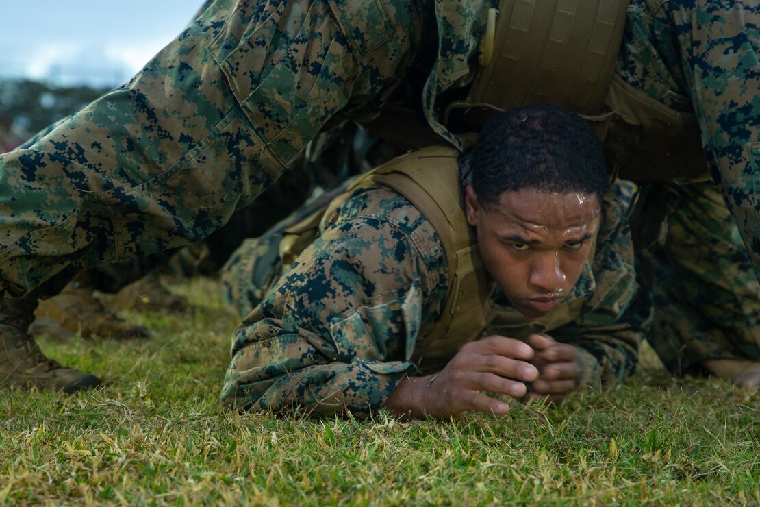 A U.S. Marine conducts physical training during the culminating event of a Martial Arts Instructor course on Marine Corps Base Hawaii, May 5, 2022. MAI courses certify Marines to instruct and monitor Marine Corps Martial Arts Program training and advance Marines in belt levels. MCMAP is a synergy of mental, character, and physical disciplines, and in concert with Marine Corps leadership principles, training in these three disciplines enhances the Marine both on and off the battlefield.