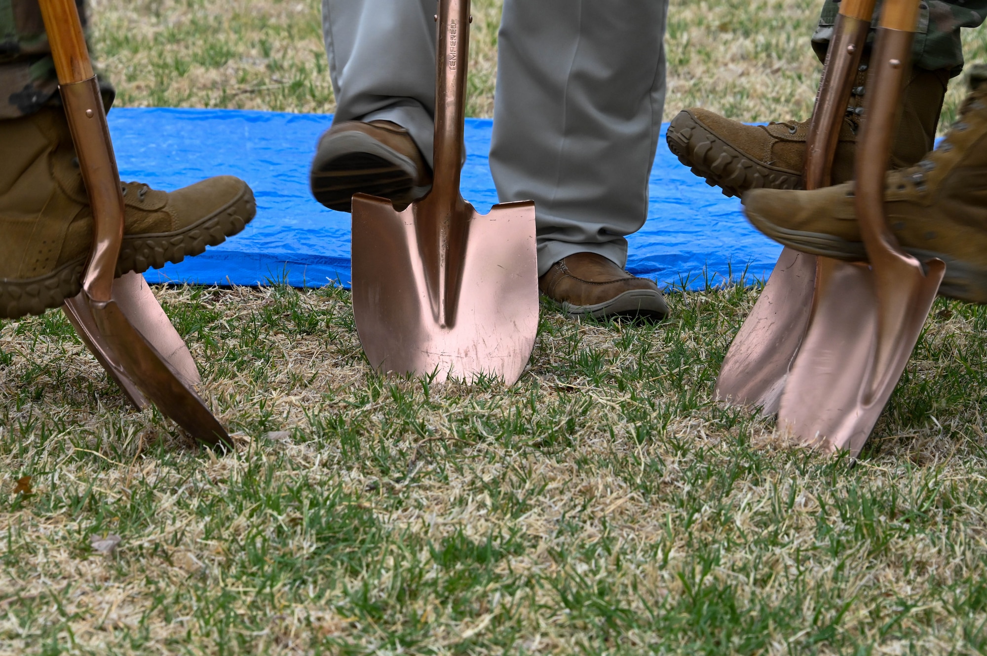 97th Air Mobility Wing Airmen and local community leaders break ground to plant a new eastern redbud tree at Altus Air Force Base, Oklahoma, May 2, 2022. The tree’s flowers are light to dark magenta pink in color, appearing in clusters from spring to early summer. (U.S. Air Force photo by Senior Airman Kayla Christenson)