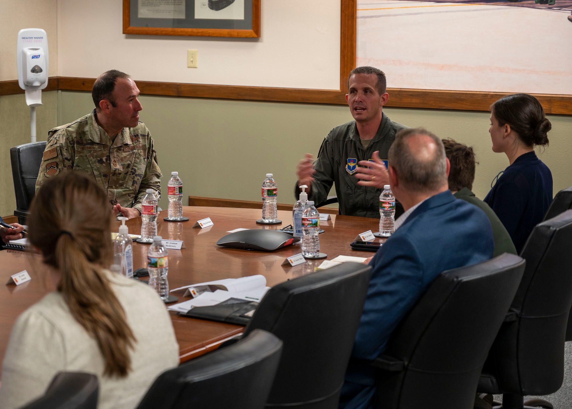 Members from the Arizona Congressional Staff Delegation receive a mission brief from the 56th Fighter Wing leadership during a visit, May 5, 2022, at Luke Air Force Base, Arizona.