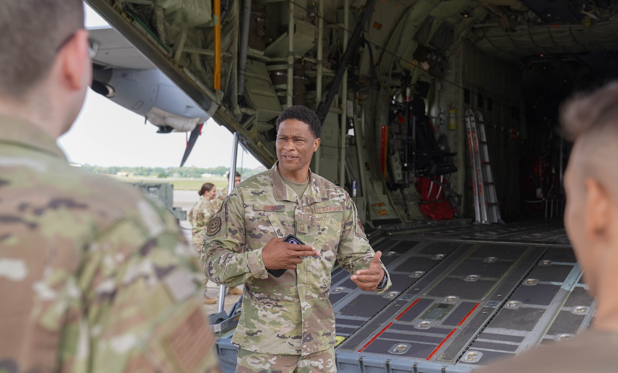 U.S. Air Force Senior Master Sgt. Adrian Bray, 81st Security Forces Squadron operations superintendent, speaks to security forces members during a joint training with the Biloxi Special Weapons and Tactics team at Keesler Air Force Base, Mississippi, May 9, 2022. Security forces and Biloxi SWAT members trained together on aircraft anti-hijacking procedures.