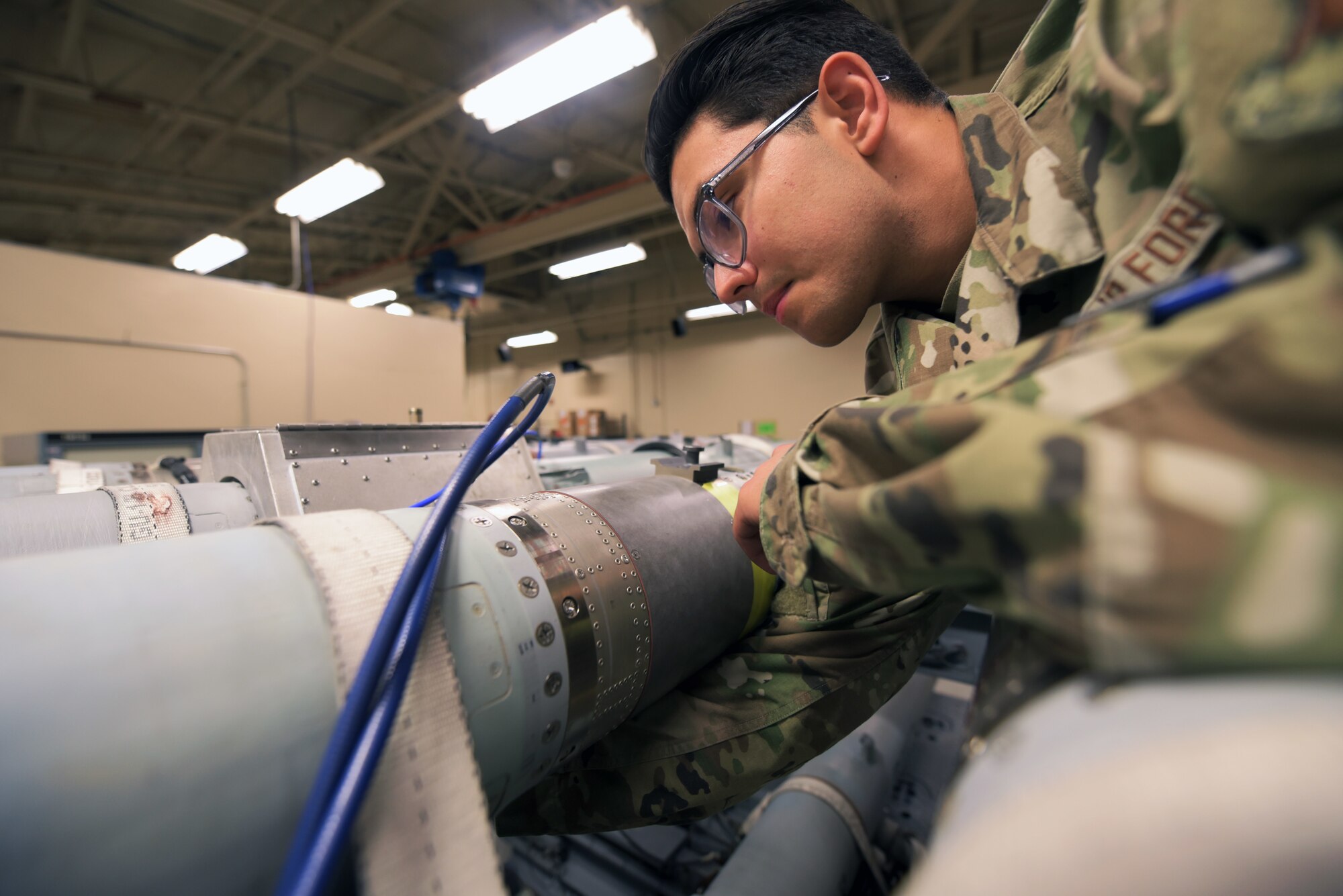 Airman works on a missile