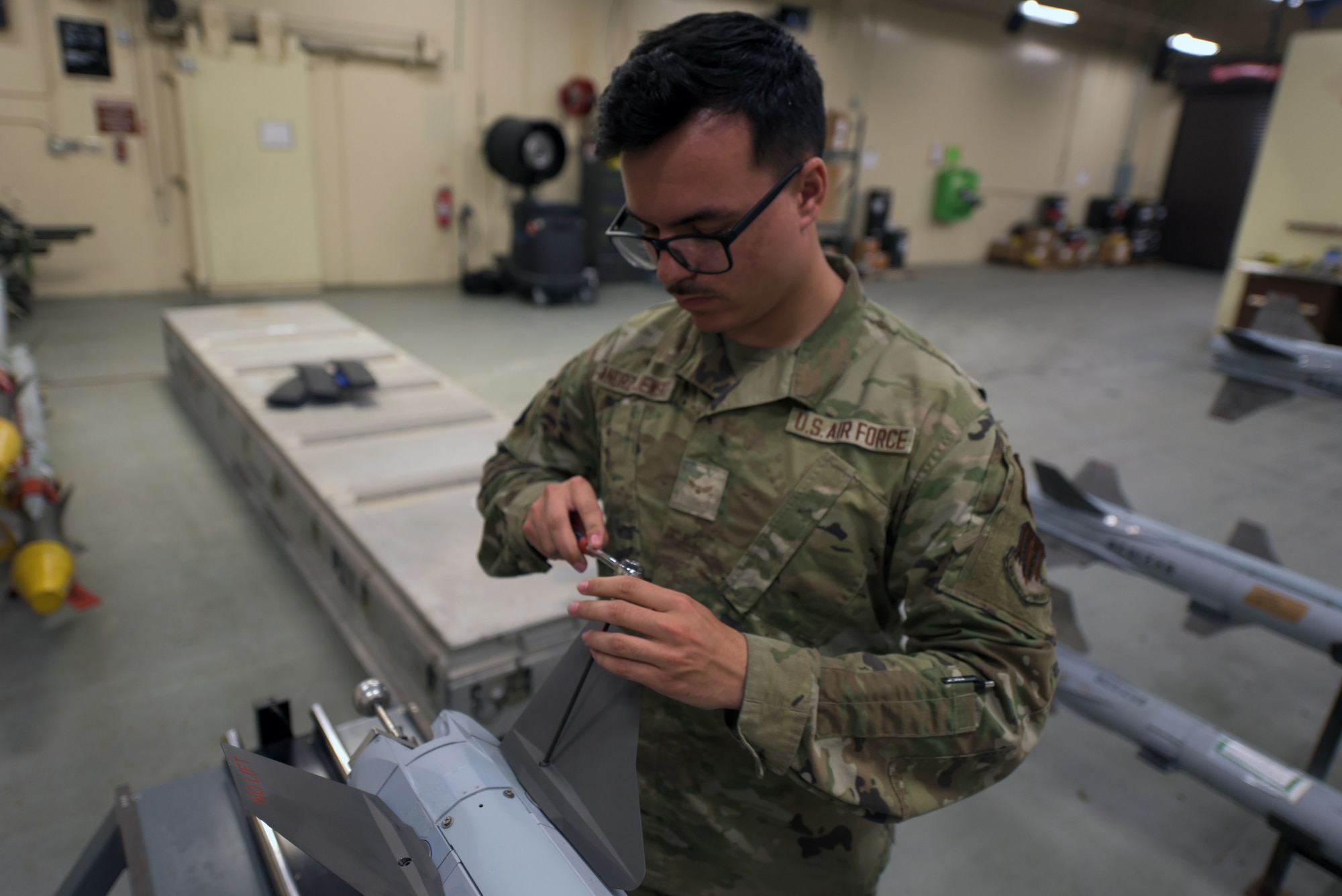 Airman works on missile