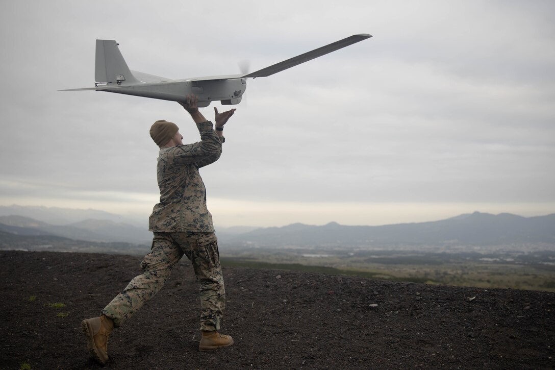 U.S. Marine Corps Cpl. Jared Hipke, a rifleman with 1st Battalion, 3d Marines, 3d Marine Division launches an RQ-20B Puma fixed wing unmanned aerial system at Combined Arms Training Center, Camp Fuji, Japan, April 28, 2022. This exercise tested and strengthened the Marines’ ability to conduct distributed operations, while demonstrating their readiness to rapidly secure and defend key terrain to maintain regional security. 1/3 is forward-deployed in the Indo-Pacific under 4th Marines as a part of the Unit Deployment Program. Hipke is a native of Brentwood, NH. (U.S. Marine Corps photo by Lance Cpl. Lorenzo Ducato)