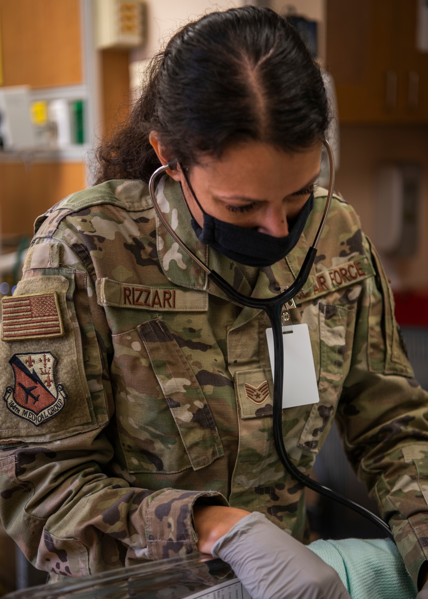 Staff Sgt. Daniella Rizarri, 104th Medical Group aerospace medical technician tends to an infant at Tripler Army Medical Center, Hawaii, May 3, 2022. Rizarii is at Tripler to provide medical support and complete training requirements. (U.S. Air National Guard Photo by 1Lt. Amelia Leonard)
