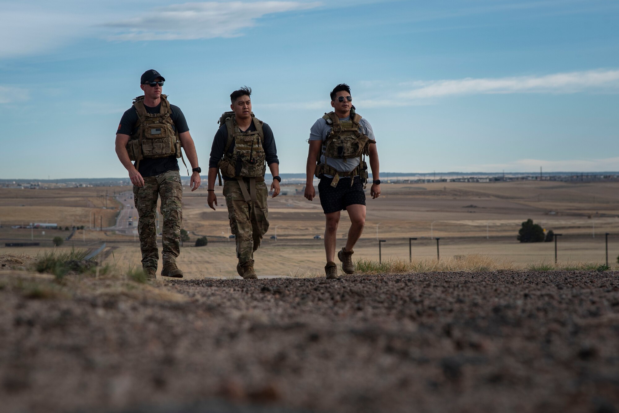 three men walking