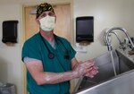 U.S. Air Force Lt. Col. Ronald Jones, 81st Medical Group chief of electrophysiology, scrubs in outside of the catheterization lab at Keesler Air Force Base, Mississippi, April 26, 2022. Jones is currently the only electrophysiologist in the Air Force and treats patients at Keesler and in the local community.