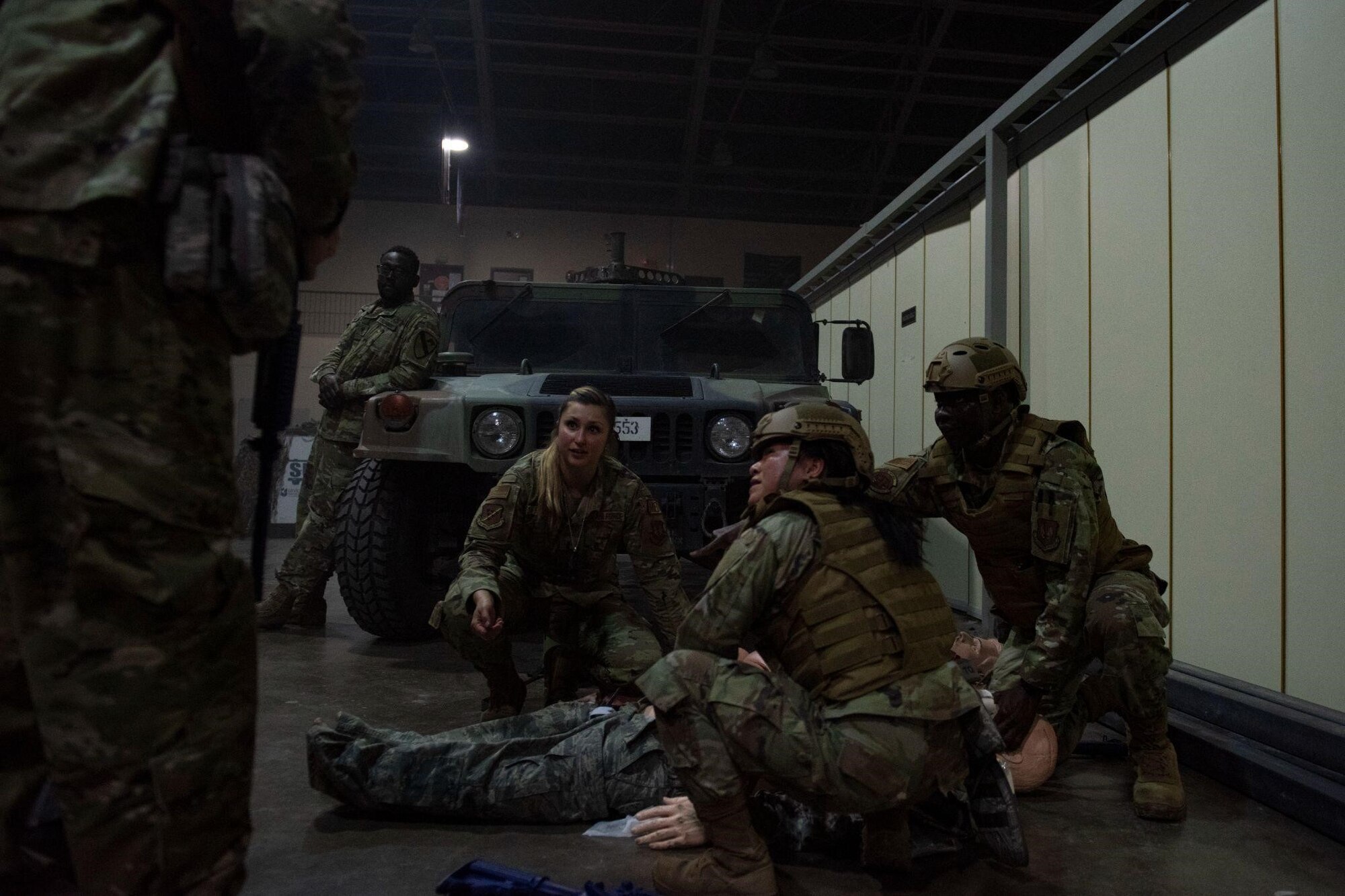 Tactical Combat Casualty Care students assigned to various units across Incirlik Air Base practice administering patient care under fire during the first combined Medic-X and TCCC course hosted by the 39th Medical Group at Incirlik Air Base, Turkey, April 24, 2022. The five-day course integrated multi-capable airman concepts into the existing TCCC curriculum to prepare all medics for prolonged field care. The Air Force Medical Service tasked the 39th MDG to beta test a combined curriculum making this the first training of its kind in the Air Force. (U.S. Air force photo by Staff Sergeant Gabrielle Winn)