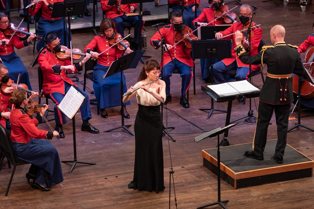 On May 8, 2022, guest soloist Mimi Stillman performed with the Marine Chamber Orchestra at the Rachel M. Schlesinger Concert Hall and Arts Center in Alexandria, Va. During the concert, she gave the world premiere of Concerto for Flute and Orchestra by composer Zhou Tian.