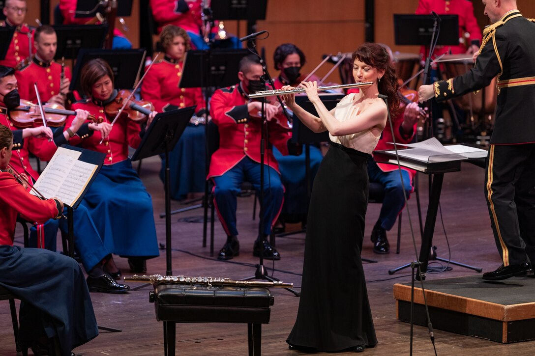 On May 8, 2022, guest soloist Mimi Stillman performed with the Marine Chamber Orchestra at the Rachel M. Schlesinger Concert Hall and Arts Center in Alexandria, Va. During the concert, she gave the world premiere of Concerto for Flute and Orchestra by composer Zhou Tian.