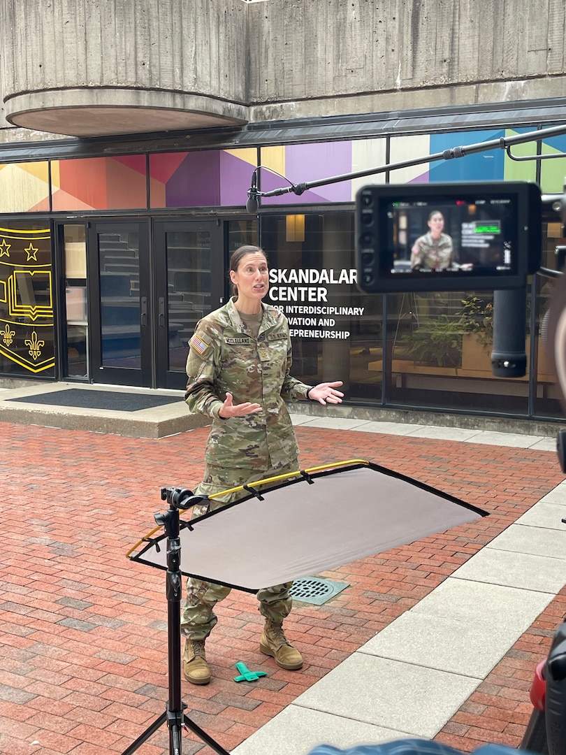 Woman in Uniform speaking