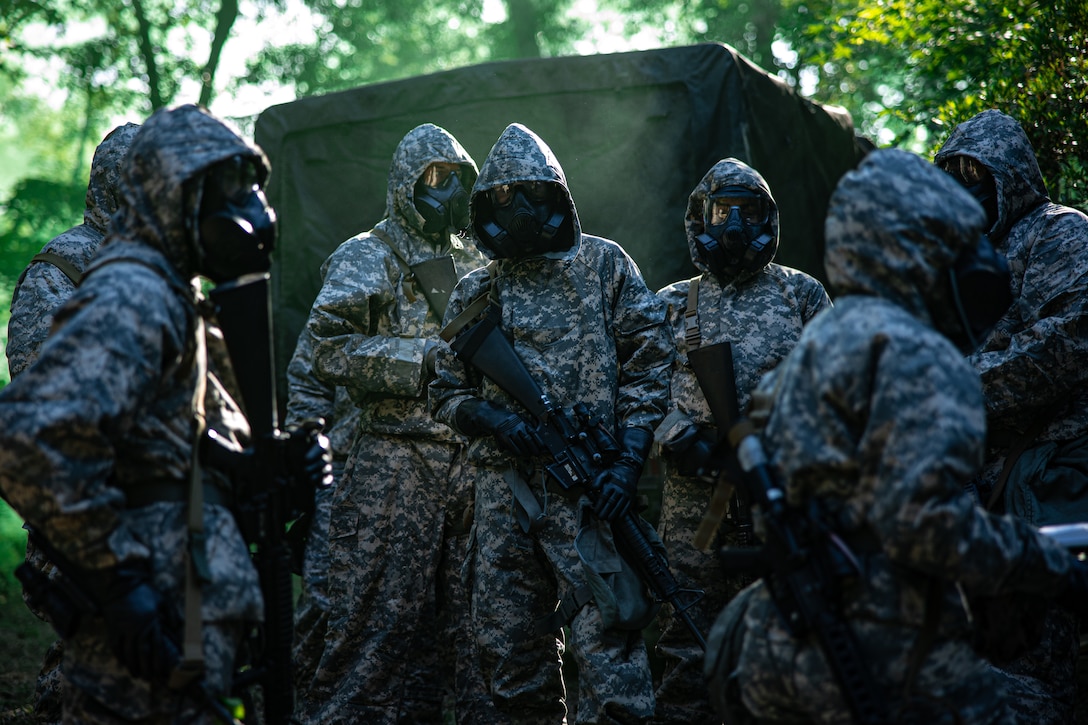 U.S. Marines with 2nd Landing Support Battalion, Combat Logistics Regiment 27, 2nd Marine Logistics Group, discuss a plan of action for decontaminating troops during Potomac Restore, a regimental exercise, at Camp Lejeune, North Carolina, May 7, 2022. This portion of Potomac Restore was utilized to enhance Marines’ and Sailors’ experience in recognizing and defending against simulated CBRN attacks.