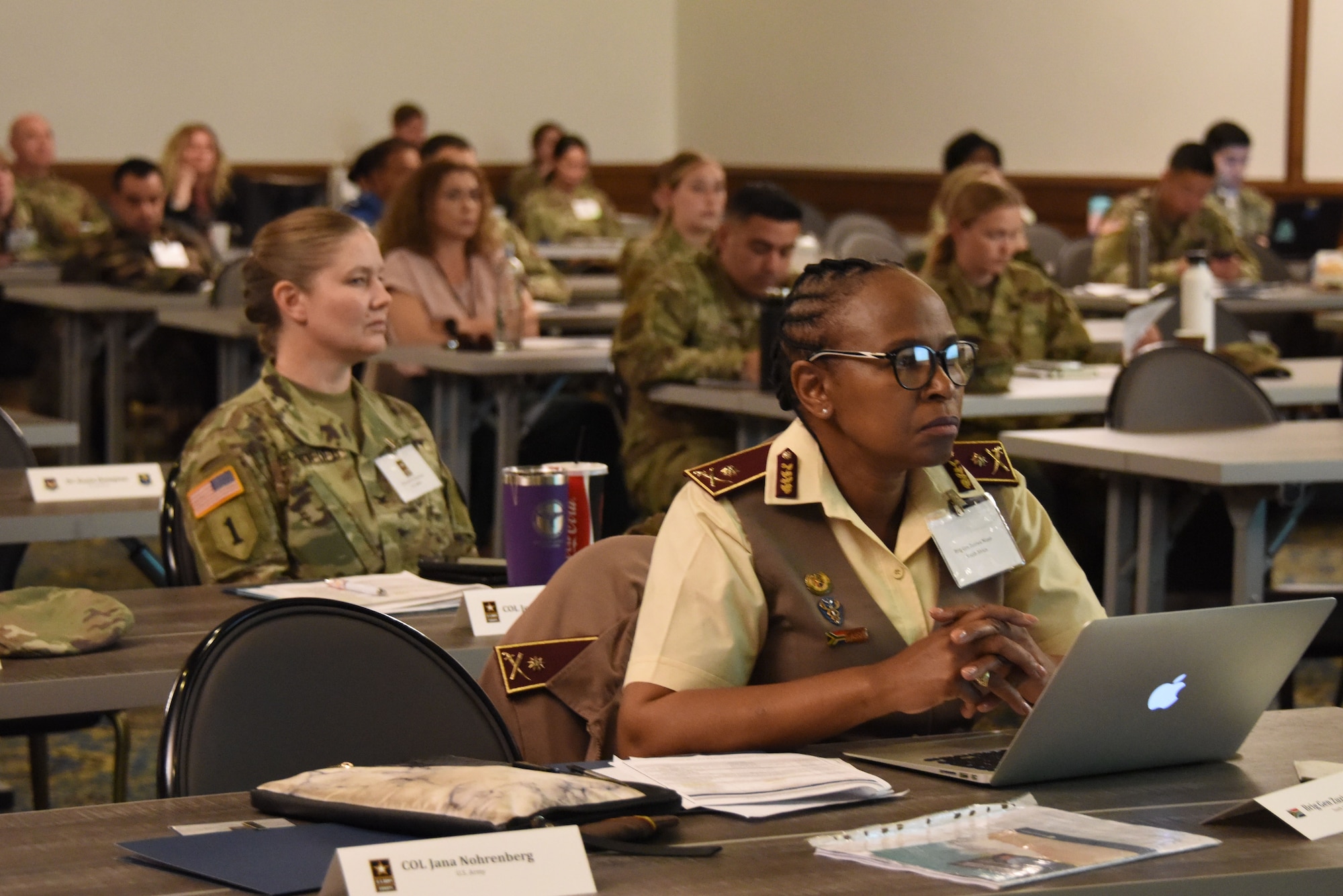 South African Brig. Gen. Zuziwe Maso, South African Military Health Services director of nursing, listens to a brief about resiliency of health providers during a pandemic as part of U.S. Air Forces in Europe - Air Forces Africa’s European-African Military Nursing Exchange conference at Ramstein Air Base, Germany, May 9, 2022.