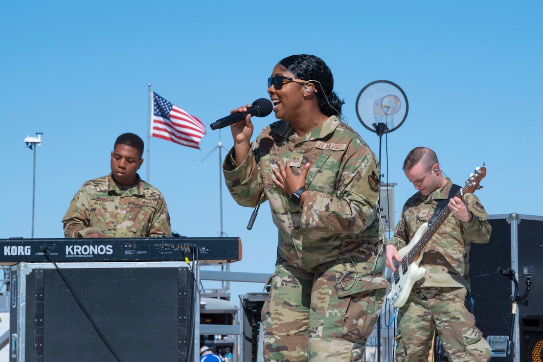 Members of the U.S. Air Force Academy Band perform May 7, 2022, on Holloman Air Force Base, New Mexico. The band performed covers of popular songs during the 2022 Holloman Legacy of Liberty Air Show and Open House. (U.S. Air Force photo by Airman 1st Class Nicholas Paczkowski)