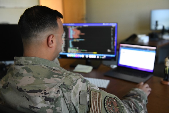 U.S. Air Force Tech. Sgt. Urich Garcia, 45th Security Forces Squadron supra coder, writes code in an application, April 25, 2022, at Patrick Space Force Base, Fla. Supra coders are Airmen and Guardians who perform duties developing, managing, and designing software for the United States Space Force.