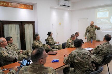 U.S. Army Maj. Gerardo Grau DeLeon, U.S. Army Cyber Command Cyber Defense Operations Center officer in charge, right, provides an overview of U.S. Army Cyber Command to Col. Luis P. Guimpel, Argentine Army Cyber Command commander, and other Argentine cyber officers May 10 at the Argentine Army Cyber headquarters in Buenos Aires, Argentina.

Personnel from U.S. Army South coordinated this three-day subject matter expertise exchange with U.S. Army Cyber Command and the Argentine Army Cyber Defense Directorate to share best practices in cyber defense and build cyber program interoperability.