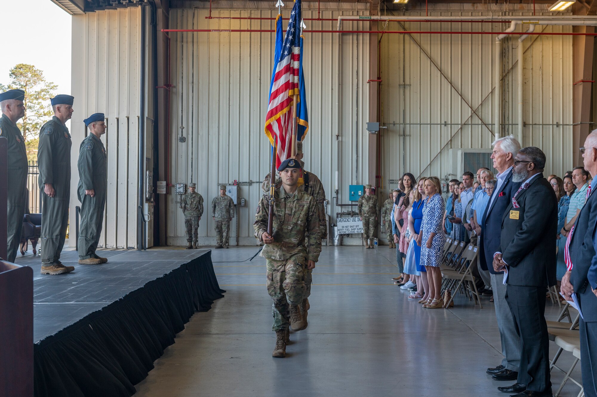 Airmen apart of the 4th Fighter Wing Honor Gaurd present the colors during the 4th FW Change of Command ceremony at Seymour Johnson Air Force Base, North Carolina, May 11, 2022. The Change of Command ceremony is a military tradition that represents a formal transfer of authority and
responsibility of a unit from one commanding officer to another. (U.S. Air Force photo by Senior Airman Kylie Barrow)