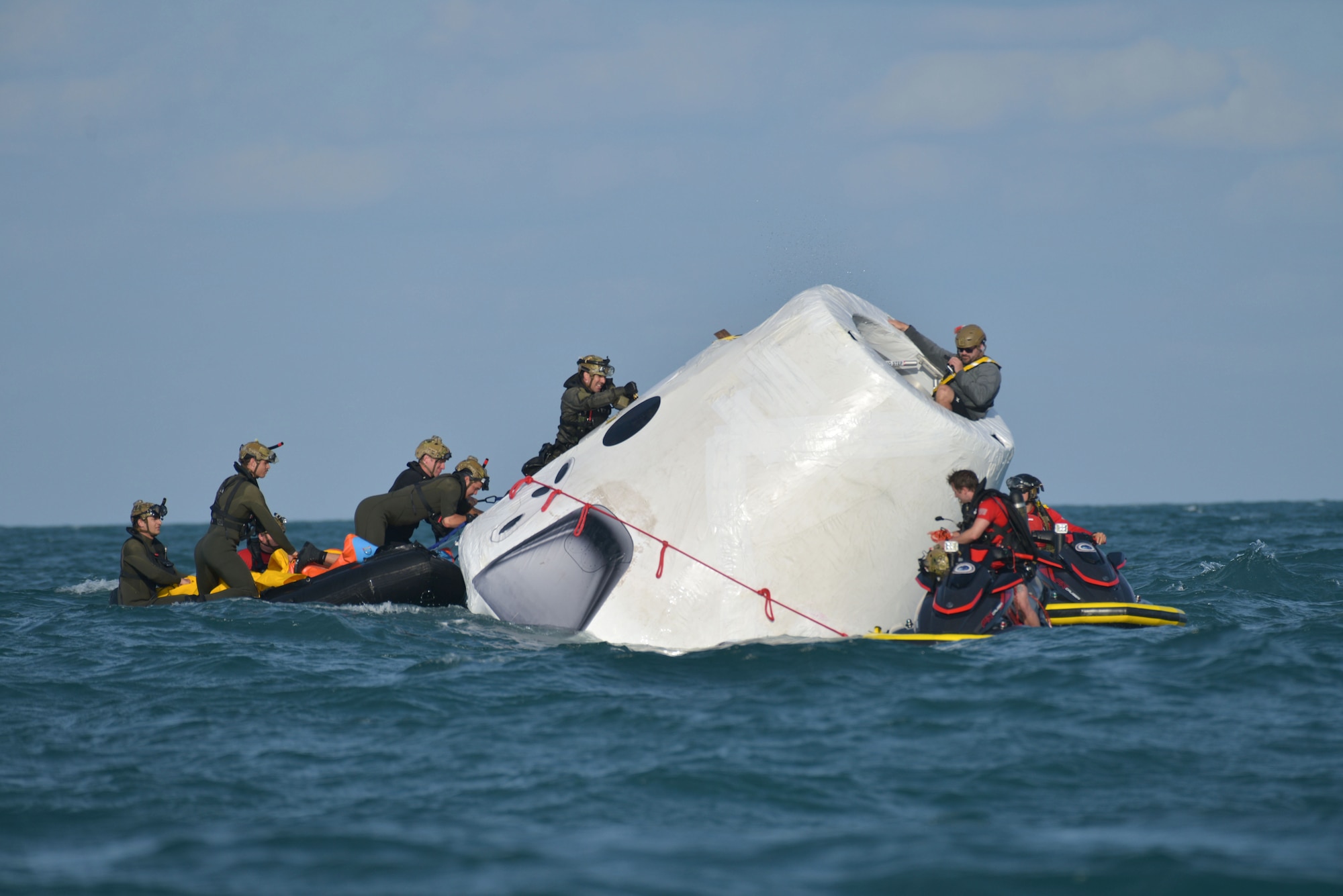 Pararescuemen from various units around the country arrived at Patrick Air Force Base, Fla., May 6, 2020, working with 45th Operations Group, Detachment 3 personnel and mission partners in the weeks leading up to the return to human spaceflight. Exercises took place at Cape Canaveral Air Force Station and off the coast of CCAFS, working on tactics and procedures for astronaut rescue and recovery operations. (U.S. Space Force photo by Senior Airman Dalton Williams)