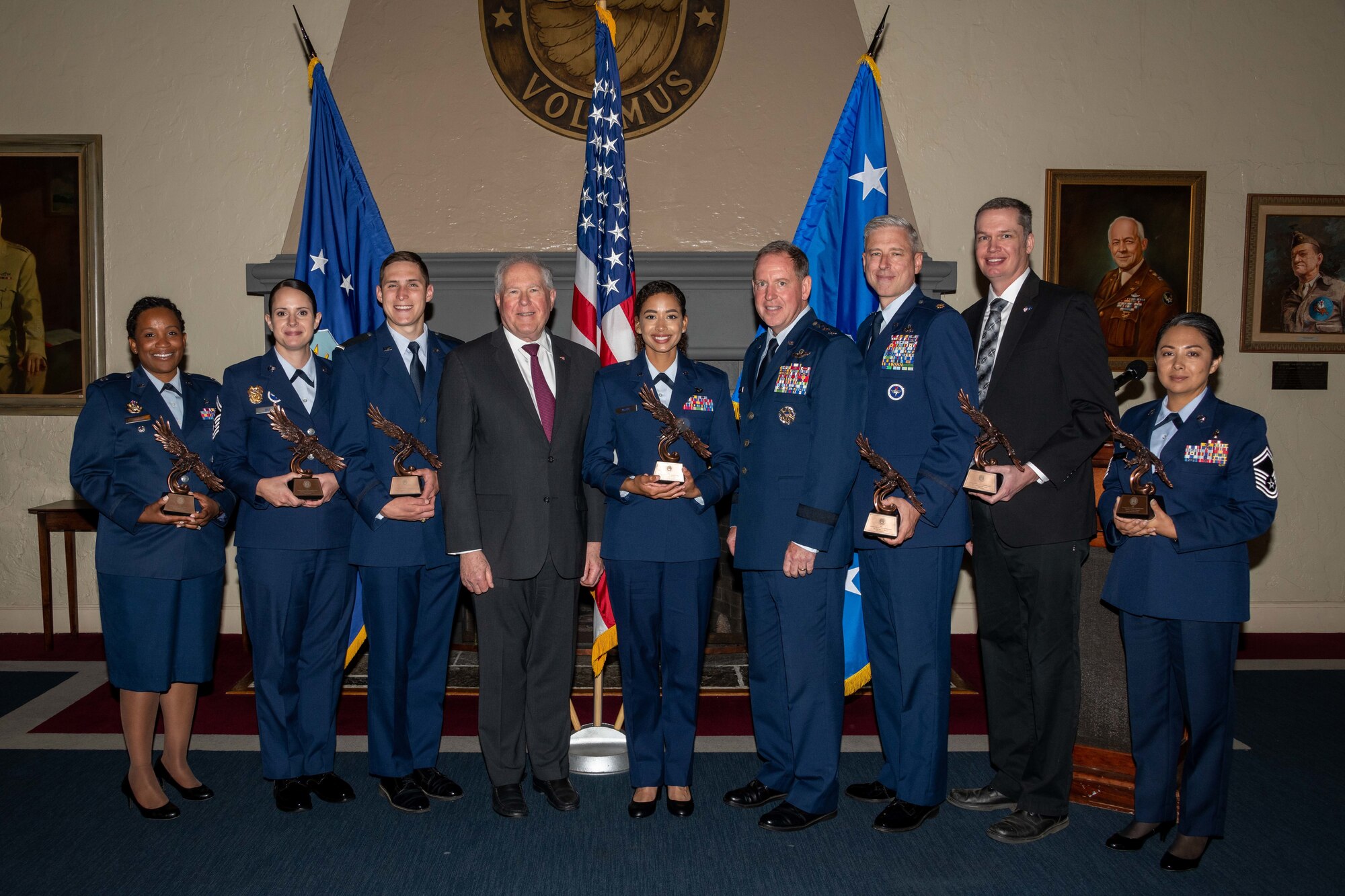 Secretary of the Air Force Frank Kendall presented leadership awards to several Air University staff, faculty, current and former students and cadets during a presentation ceremony April 10, 2022, Maxwell Air Force Base, Alabama. The Secretary of the Air Force Leadership Award Airmen who exhibit exemplary leadership, character and ethical behavior. Award recipients pictured with Kendall (fourth from left) and Lt. Gen. James Hecker (sixth from left), Air University commander and president, are Lt. Col. Stephanie Wilson, Senior Master Sgt. Krystle Hill, Air Force ROTC Cadet Andrew Bainbridge, Officer Training School Cadet Taylor McOnie, Maj. Brian Boyle, Dr. Andrew Bowens and Senior Master Sgt. Anisa Haney. Recipient Capt. Joseph Halley was not available for the presentation ceremony. (U.S. Air Force photo by Melanie Rodgers Cox)
