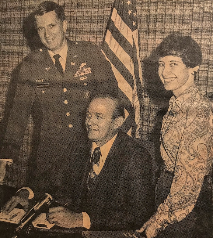 GALVESTON, Texas -- Lynn Alperin (right) is joined by U.S. Army Corps of Engineers (USACE) Galveston District Commander [1977] Col. Jon C. Vanden Bosch (left) and Galveston Mayor John Unbehagen at a signing proclaiming November 14 through 18 as "Corps of Engineers History Week." Alperin wrote, "Custodians of the Coast," a historical review of the Galveston District. Many district commanders and employees considered the book the definitive history of the USACE's presence in Galveston, Texas. 

Newspaper clipping provided by Lynn Alperin