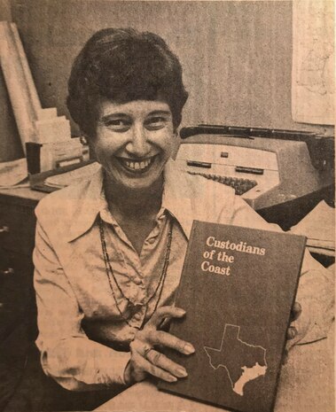 GALVESTON, Texas -- Lynn Alperin shows off her history of the U.S. Army Corps of Engineers (USACE) Galveston District in a photo publised in the Galveston Daily News, November 18, 1977. Her book, "Custodians of the Coast"  was considered by many, including the USACE Office of History, one of the best historical accounts of a USACE district. 

Newspaper clipping provided by Lynn Alperin