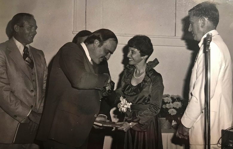 GALVESTON, Texas -- Lynn Alperin (center) is received at a gala event at Galveston's Ashton Villa, November 18, 1977. The U.S. Army Corps of Engineers (USACE) Galveston District, the Galveston Chamber of Commerce, and the Galveston Historical Foundation sponsored the event to celebrate the publication of Alperin's book, "Custodians of the Coast." For a long time, Alperin’s book was considered required reading for incoming district commanders.