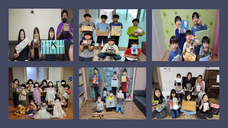 Children at Sungyook Orphanage take part in a group photo after receiving their gift on Children’s Day, May 5. All 54 children received a personal gift they chose. (Courtesy photo)
