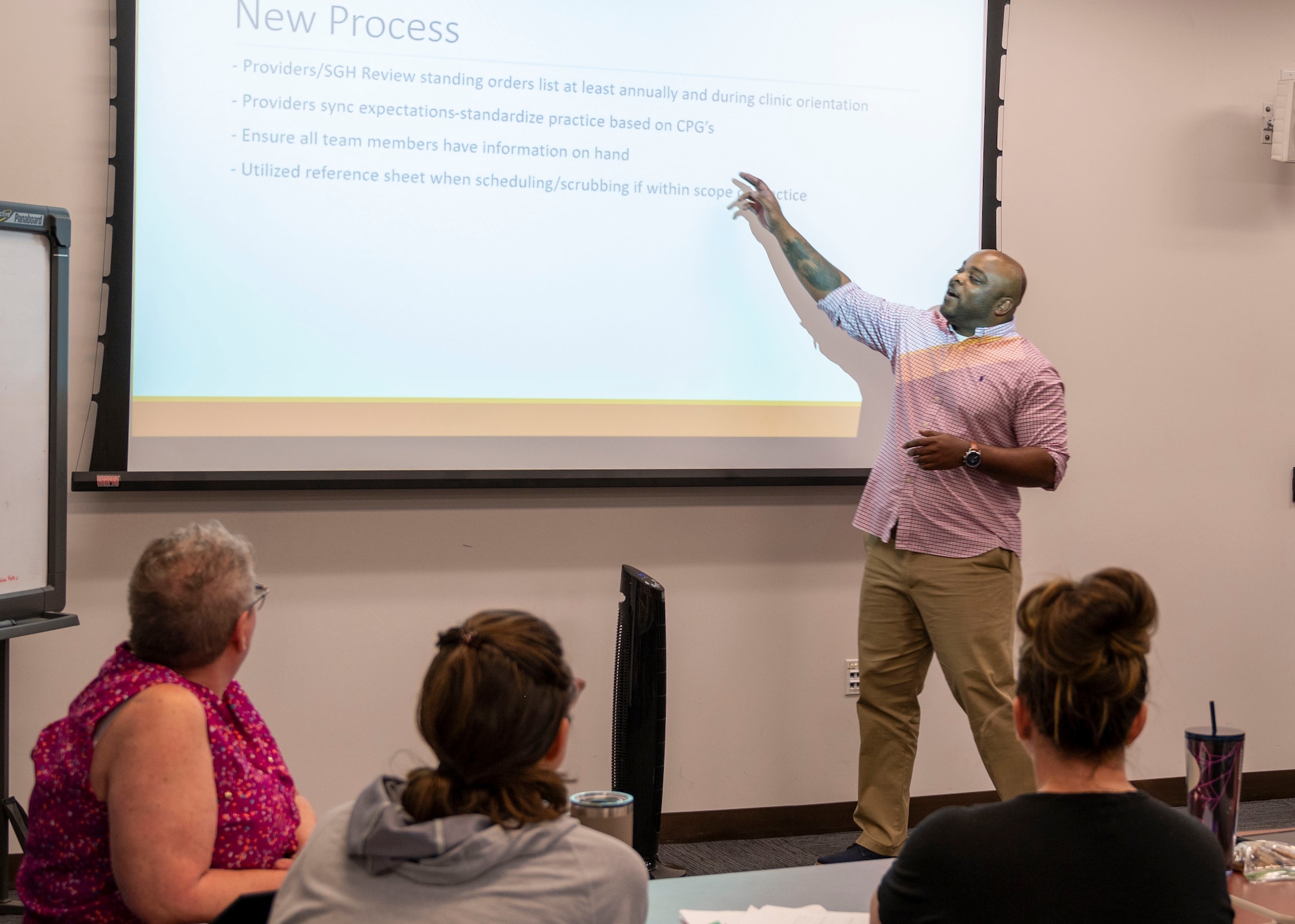 Tech Sgt. D’Mario Revere, 56th Operational Medical Readiness Squadron independent duty medical technician, presents Air Force Medical Home personnel process improvement opportunities for clinic operations and procedures, April 28, 2022, at Luke Air Force Base, Arizona.